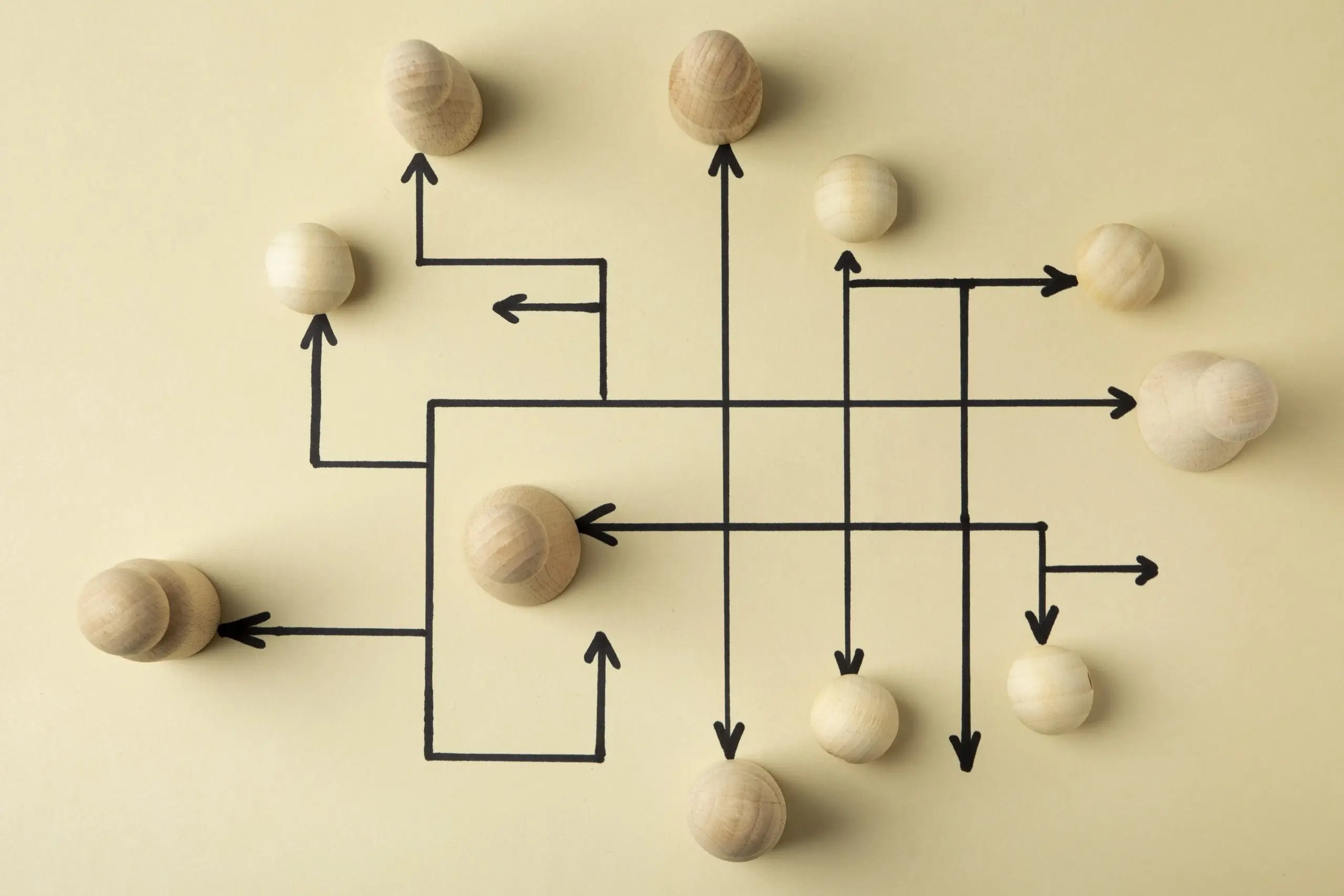 top-view-wooden-pawns-arrangement-scaled-1